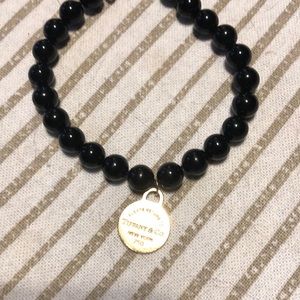 Tiffany and co onyx bracelet with gold charm